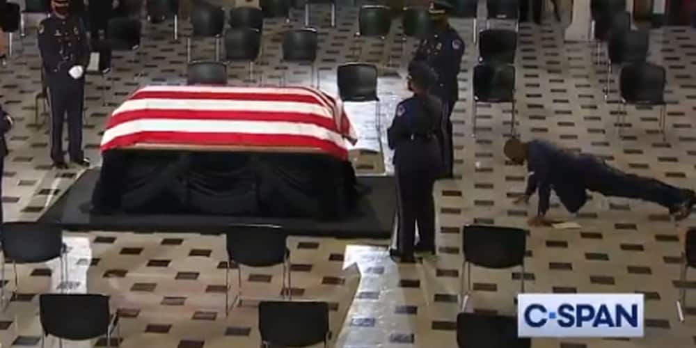 WATCH: RBG's longtime trainer does push-ups in front of her casket.