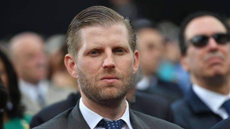 Eric Trump tweets fake photo of 50 Cent and Ice Cube wearing Trump hats.