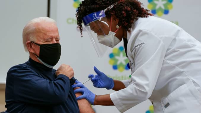 Biden receives his first dose of COVID vaccine publicly.