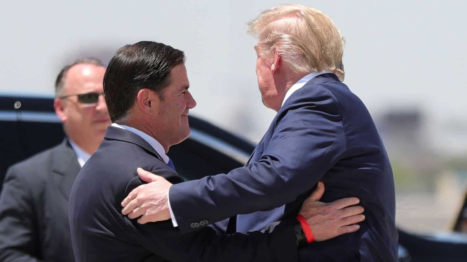 Arizona GOP governor ignores Trump's phone call while certifying Biden's victory.