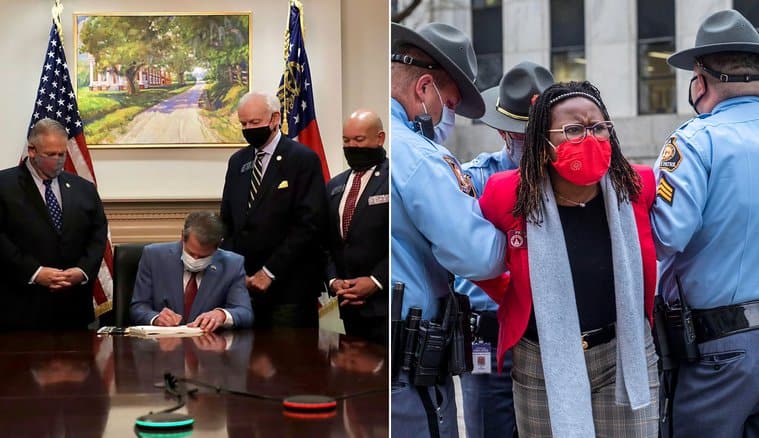 Photos from bill signing in Georgia captures the true meaning behind Republicans restrictive voter laws.