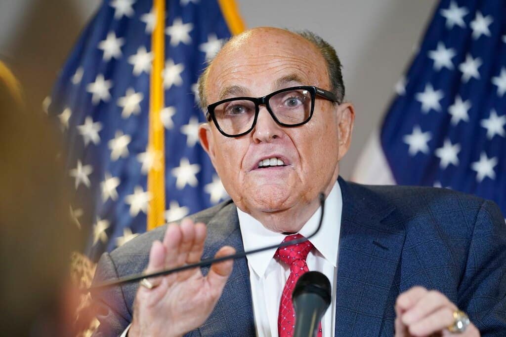 Giuliani suspended from YouTube for two weeks for spreading lies about the election.