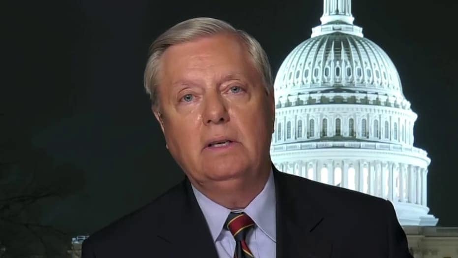 Lindsey Graham blasts Joe Biden for playing the "race card" in responding to Georgia election law.