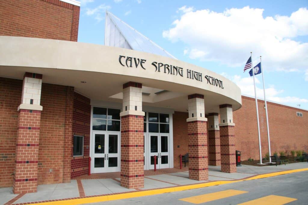 Virginia school district probes photo mocking George Floyd's death to celebrate football team's victory.