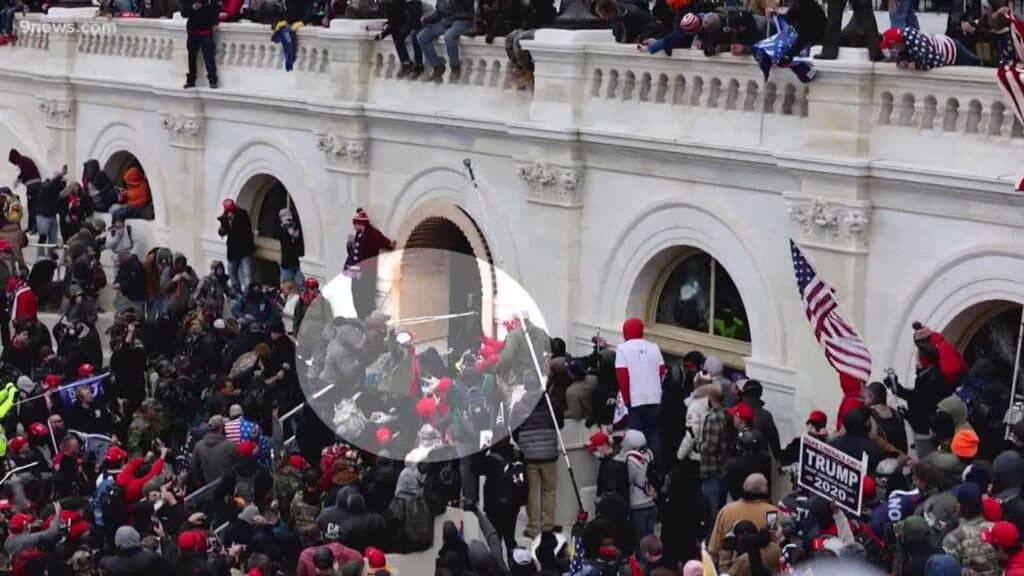 Capitol rioter who tried to run away to Switzerland must remain in jail until trial, judge says.
