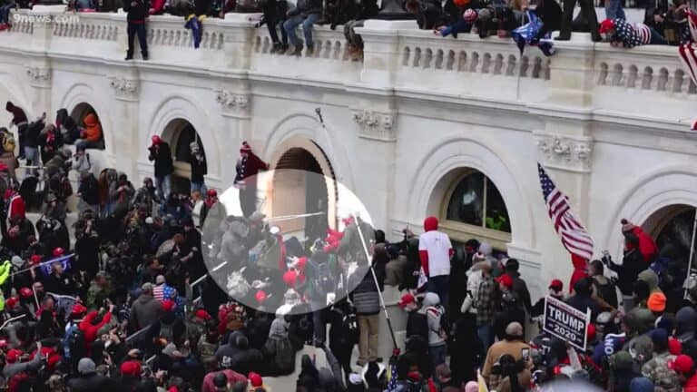 Capitol rioter who tried to run away to Switzerland must remain in jail until trial, judge says.