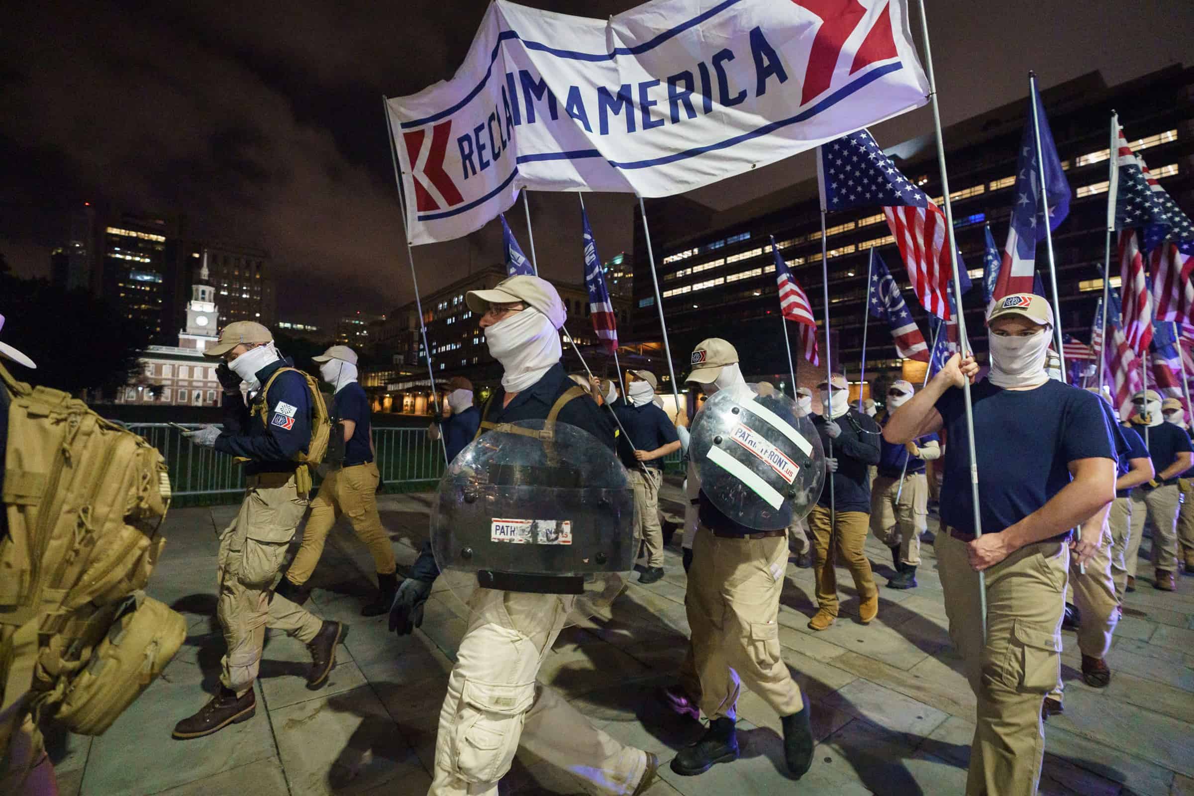 Masked White Supremacists clash with bystanders at march in Philadelphia.