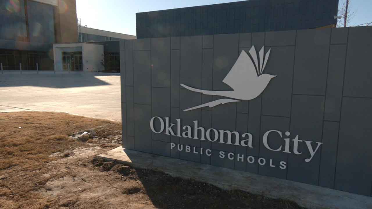 Oklahoma school district places 6 employees on administrative leave for refusing to wear a face mask.