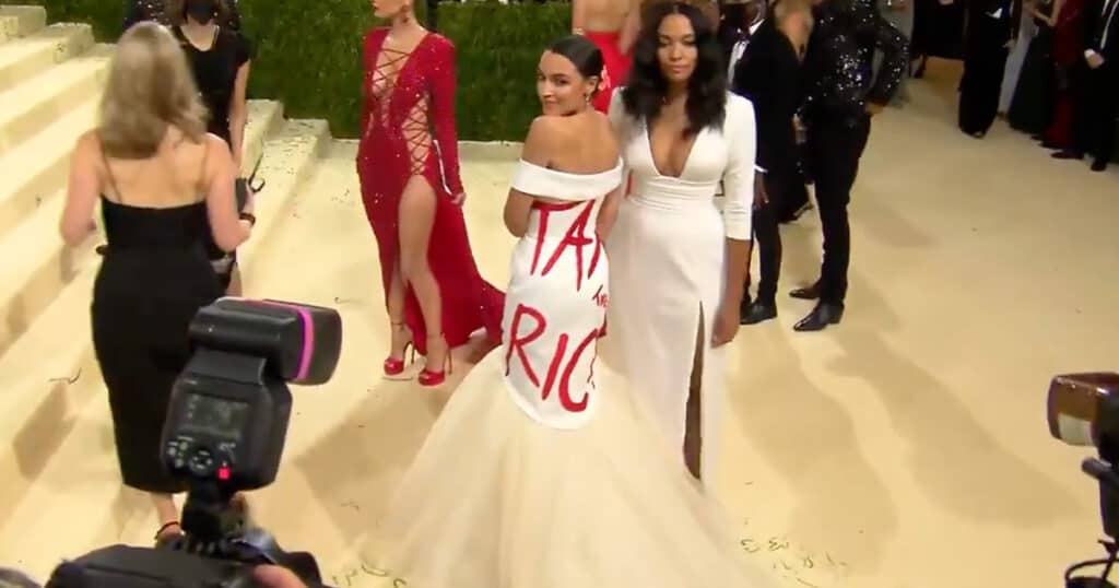 Alexandria Ocasio-Cortez Wears 'Tax the Rich' Dress to Met Gala.