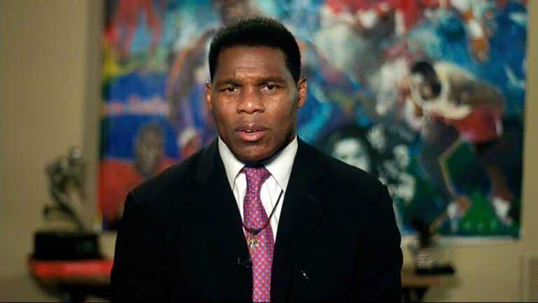 Trump-backed Georgia senate candidate Herschel Walker cancels fundraiser hosted by donor with swastika as profile photo after defending it.