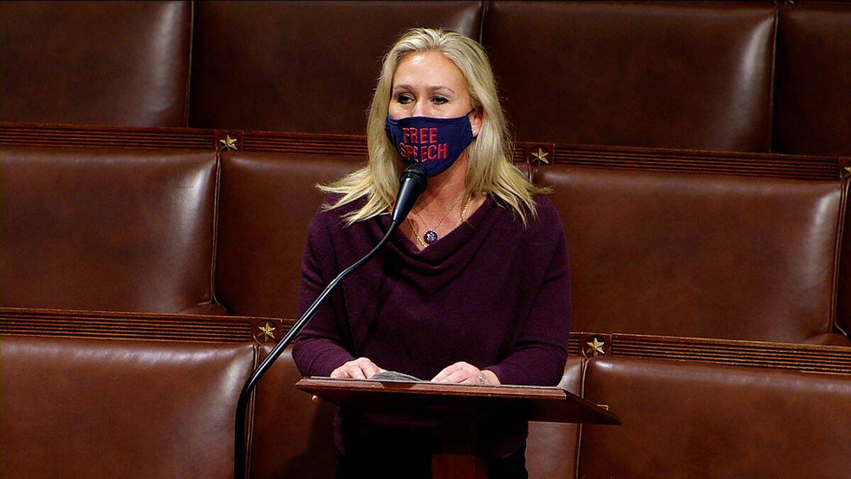 Marjorie Taylor Greene clashes with members of the Jan. 6 select committee on the House floor.