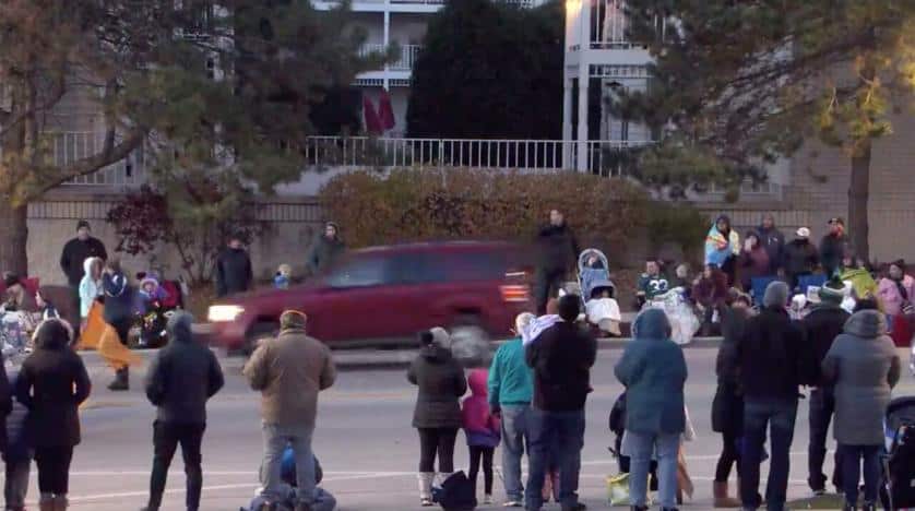 Man arrested for driving a car through Wisconsin Christmas parade was fleeing a knife fight, report says.