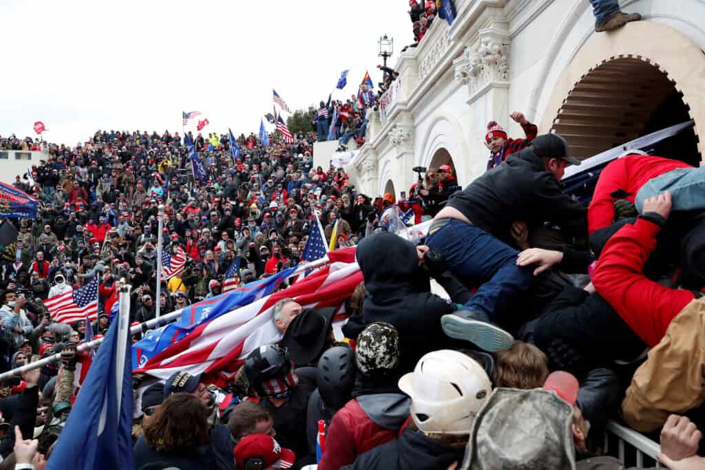 Members of the Oath Keepers return to the Capitol on Jan. 7 to 'probe their defense line.'