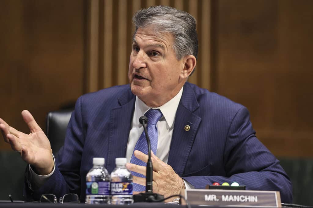 Sen. Manchin touts Alabama football coach's opposition to changing the filibuster.