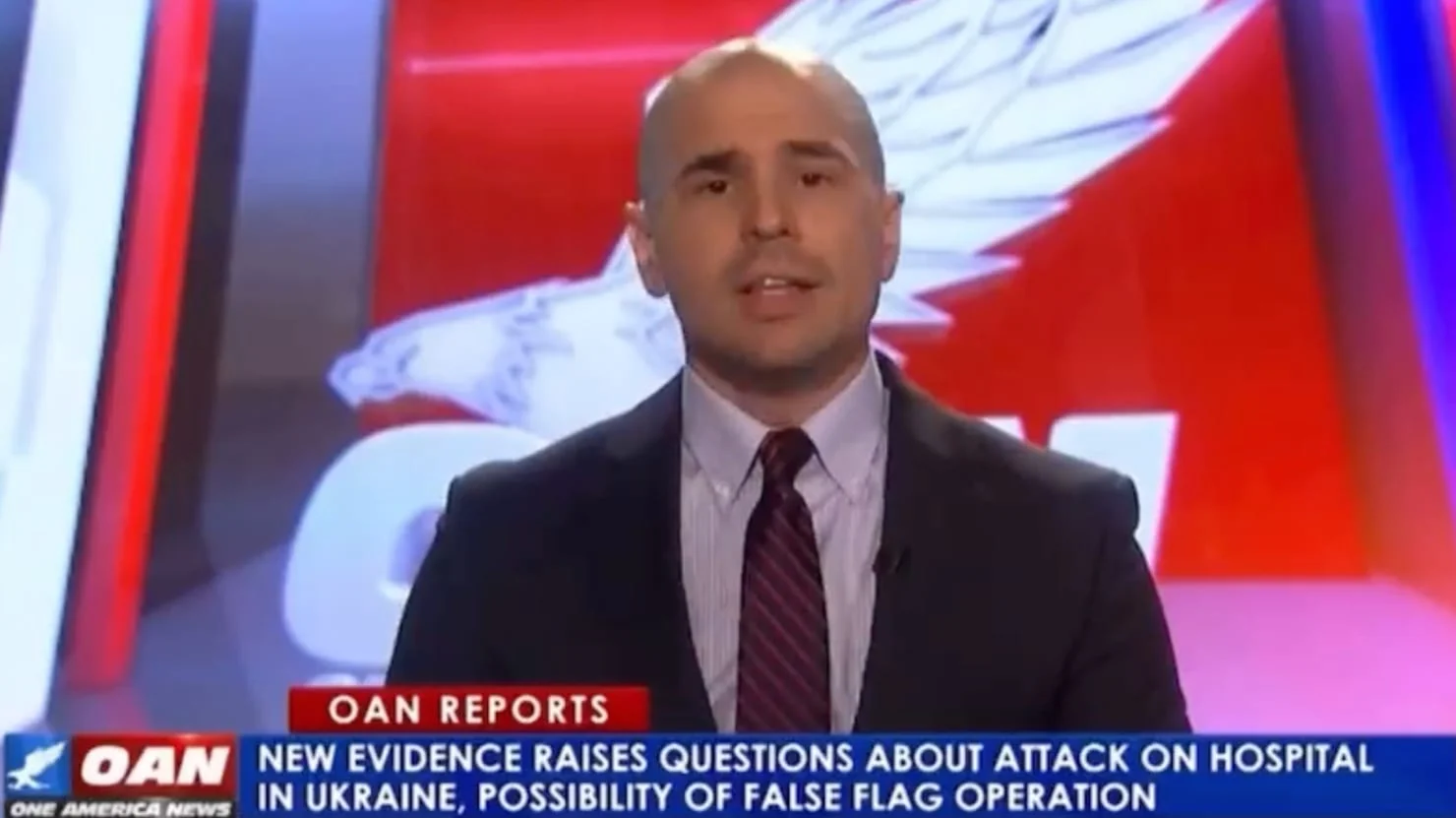 OAN host suggests Biden is bombing Ukraine in 'false flag' operation to distract from domestic issues.