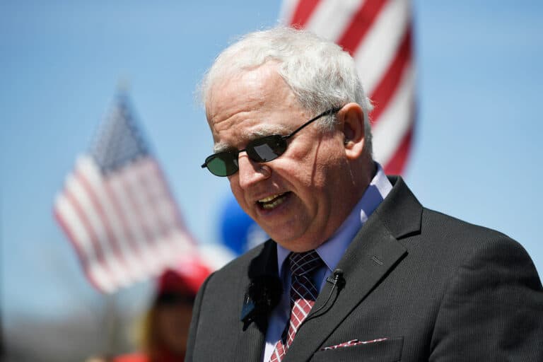 Former Trump lawyer John Eastman surrenders in Georgia.