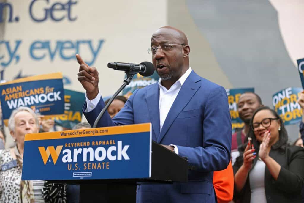 Volunteer for Sen. Raphael Warnock’s campaign shot while canvassing.