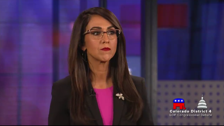 Boebert pressed on her record of passing bills during debate.